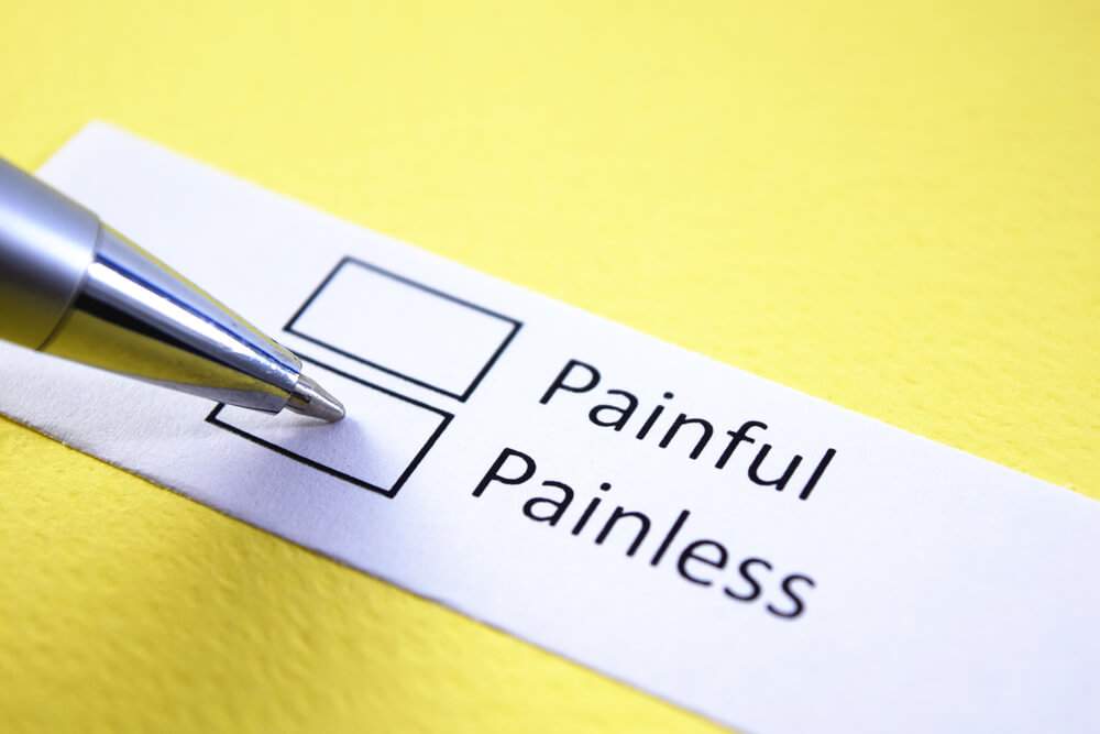 Two tick boxes with ‘painful’ and ‘painless’ options