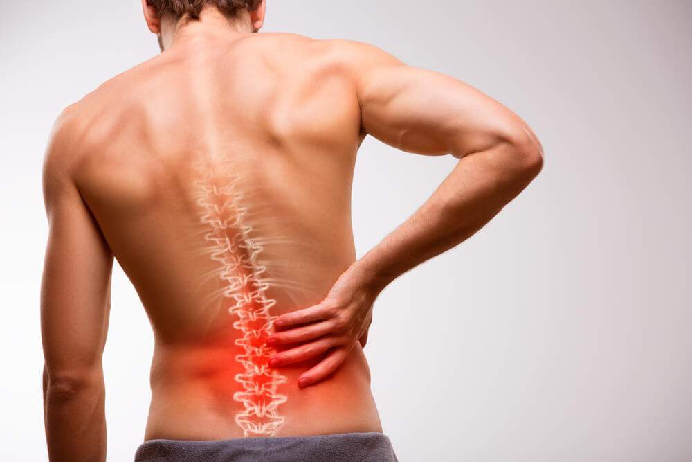 A man is suffering from low back pain